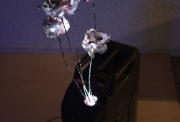 Fleurs de Kerosene, 2008, sac plastique jerricane en aluminium, video projection